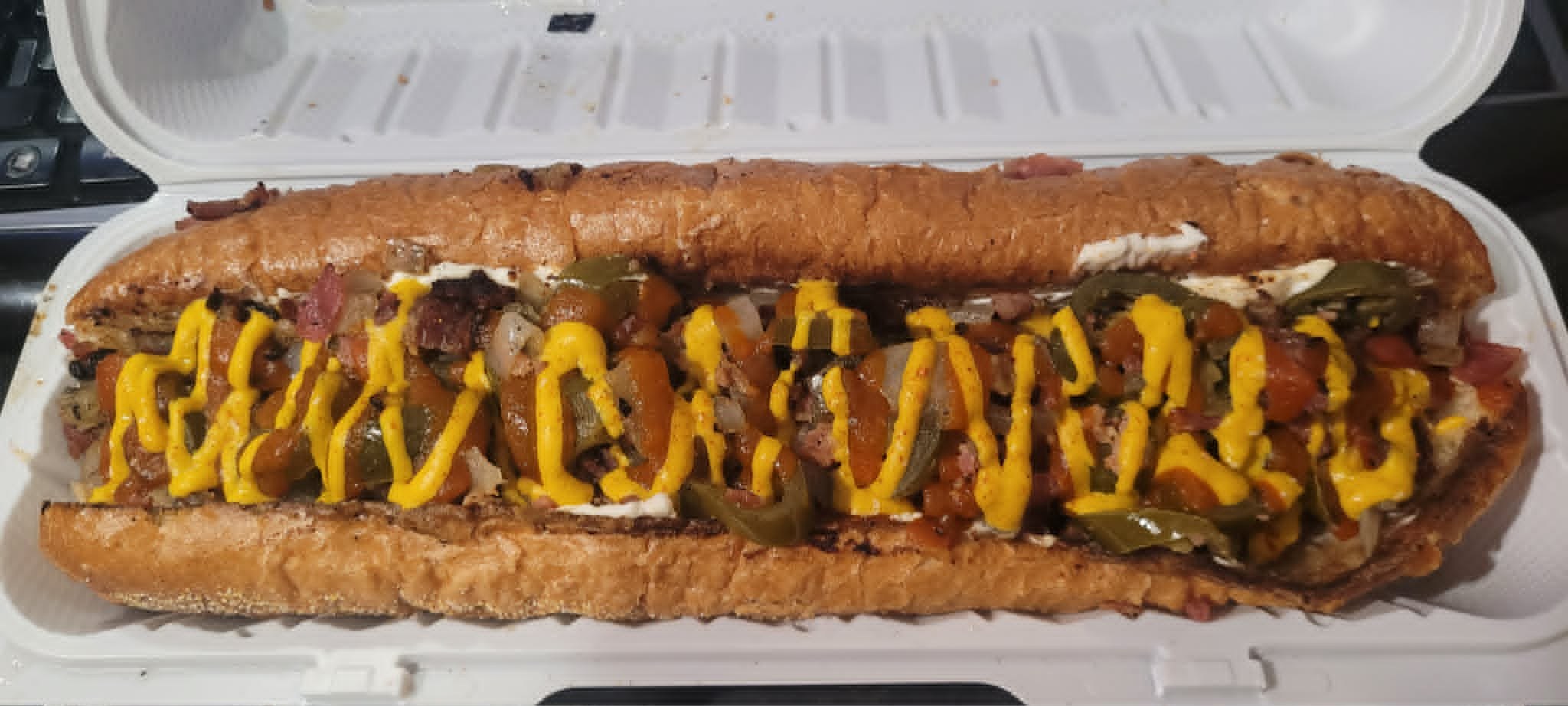 Biggz Favorite from Donny's Dogs: a 12-inch Seattle Dog with bacon added, topped with jalapeños, onions and mustard