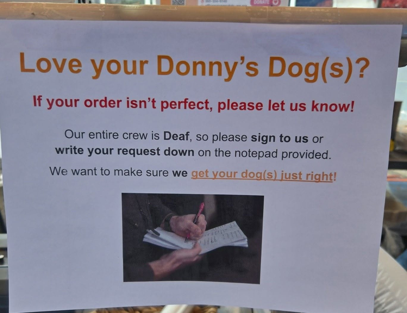 Sign at Donny's Dogs: our entire crew is Deaf, so please sign to us or write your request on the notepad provided